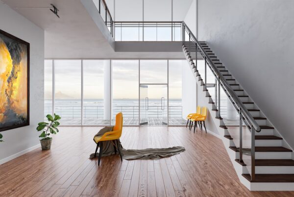 Modern living room with white feature wall and neutral décor