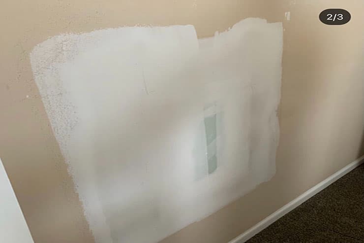 A vacant room with a window and a painted wall, showcasing options for repainting in rental houses in Adelaide.